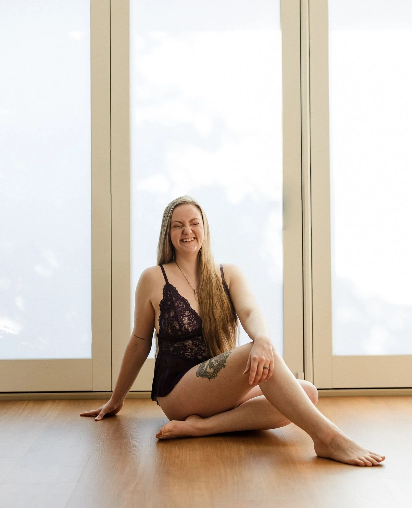 When Ashley saw this portrait, she instantly loved it because of her scrunchy nose! She said her nose scrunch is always a sign of an authentic smile -- it's one of her partners favorite features, and made her feel very *her* in these portraits. I loo