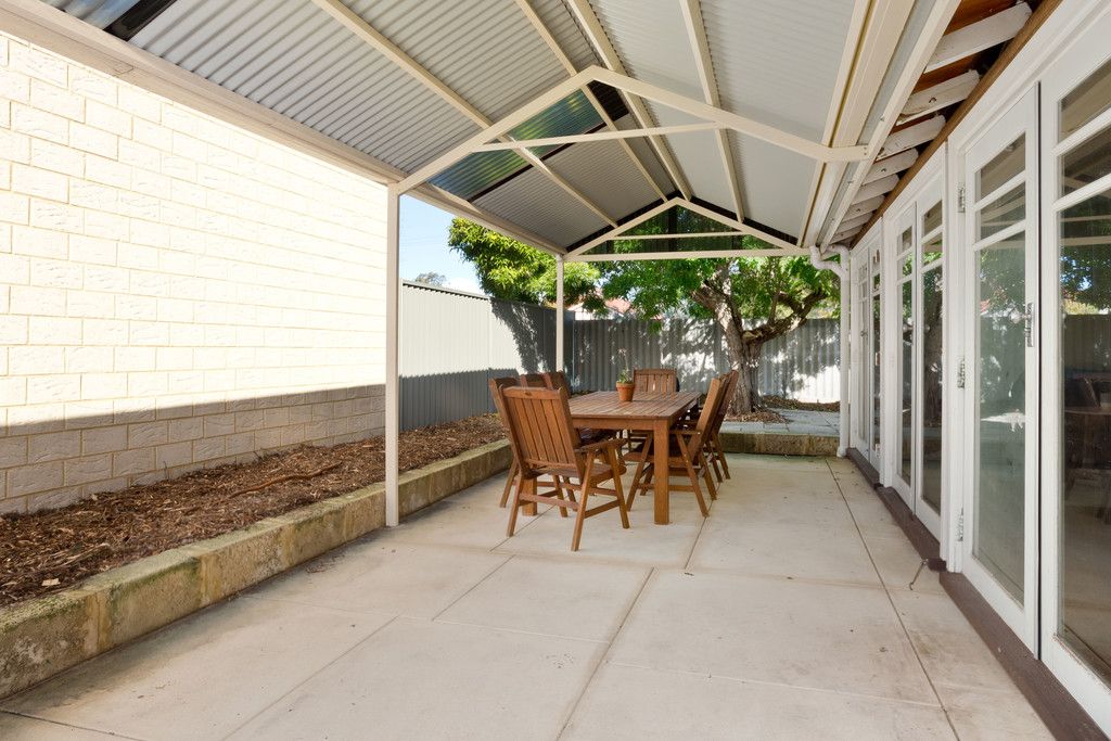 Our back yard and patio - lots of mulch and limestone