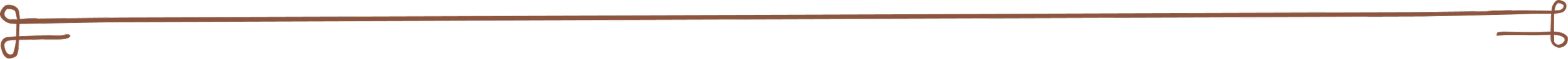 Close-up of a dark brown guitar neck and tuning pegs.