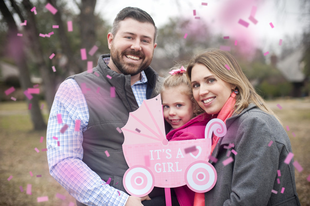 Confetti cannon gender reveal with the entire family. It's a girl!