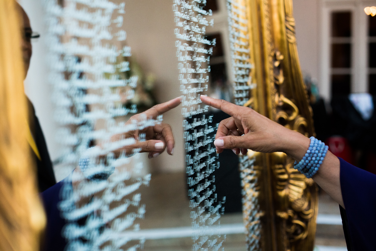 Dreamy+Romantic+Wedding+at+Historic+Los+Angeles+Ebell+Club+table+assignment+on+mirror.jpg