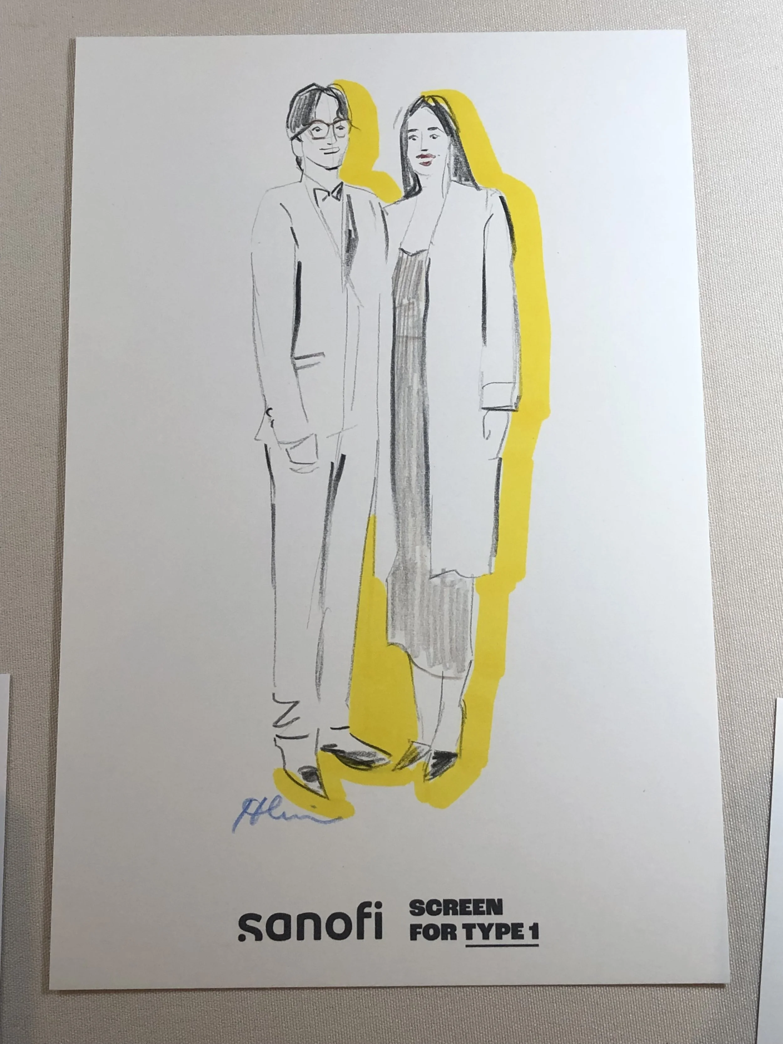 Sketch of a man and woman standing together, with the man wearing glasses and a suit, and the woman wearing a dress and coat, outlined in black with a yellow highlight behind them, and the text "Sanofi SCREEN FOR TYPE 1" at the bottom.