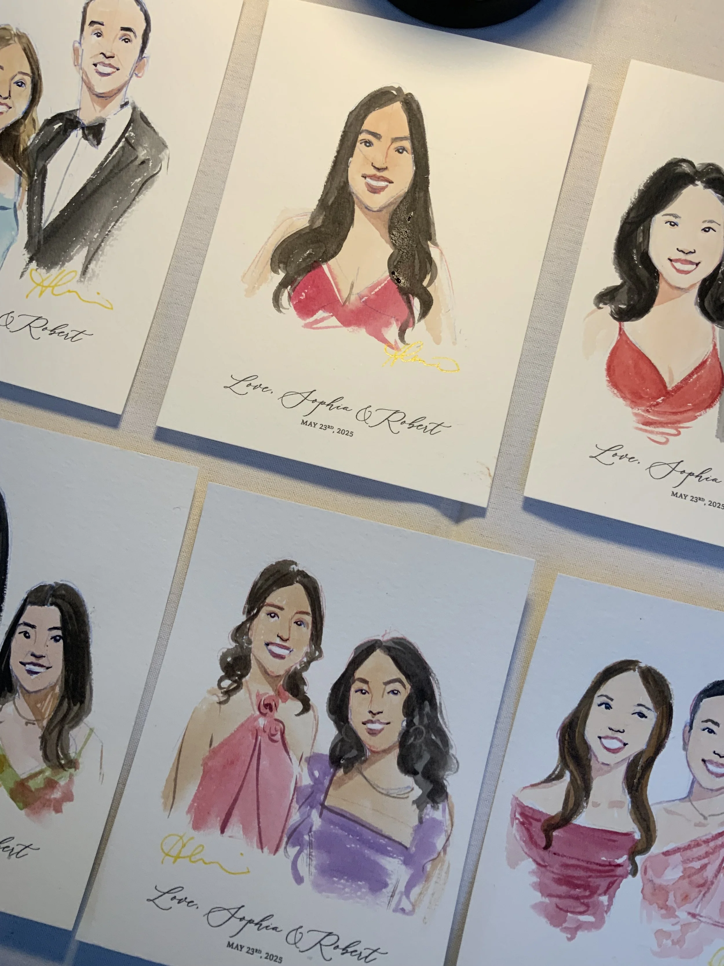 Collection of watercolor portraits of women, each with handwritten signatures and the text 'Love, Sophia & Robert' and the date May 23rd, 2025.