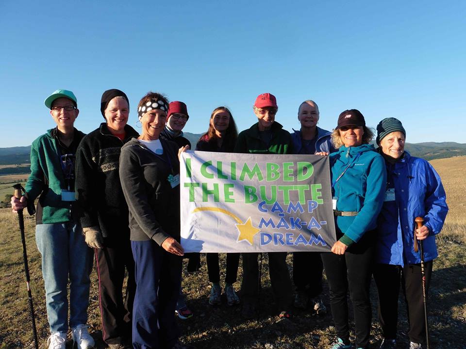 Group of People Pose after Climbing a Butte at Camp Mak-a-Dream