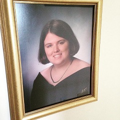 Here's a visual..My senior photo..It made my mom happy.