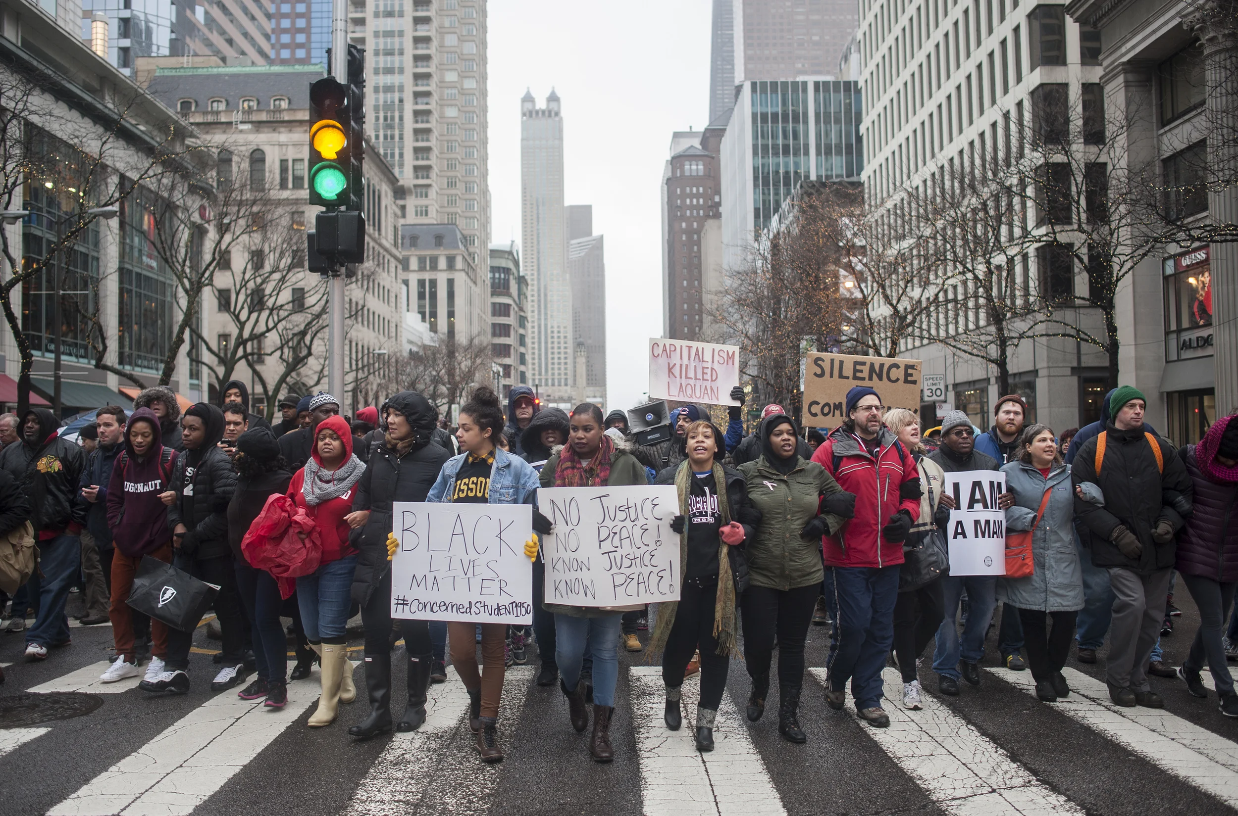 Protestors chants at the Magnificent Mile during Black Friday November 27, 2015 at a protest in memory of Laquan McDonald, backed by Reverend Jesse Jackson and other elected officials. Protest have been happening since the release of dash cam video of the killing of Laquan McDonald by Chicago Police officer Jason Van Dyke. (William Camargo)