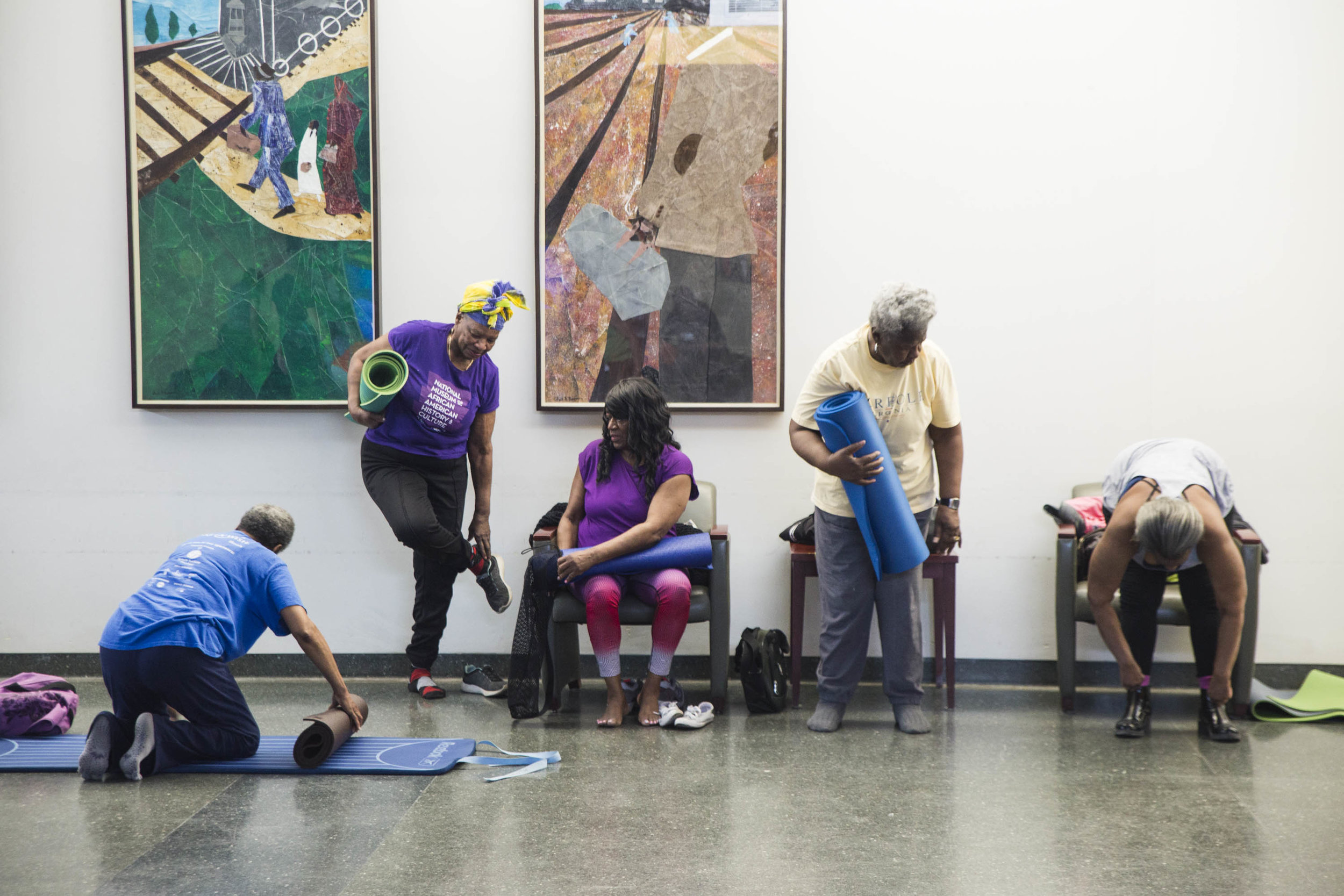  Older adults attend a free yoga class taught by Tony Stevens in the senior satellite in Abbott Park in Roseland. 