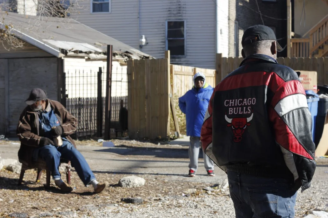 Rock still spends a lot of time in the lot, talking to community members who gather there.