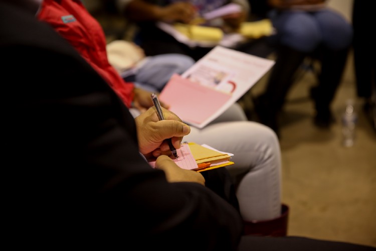 Attendees take notes and respond to questions at City Bureau’s October 2015 public launch event on Chicago’s South Side.