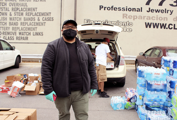  Edgar Flores is an organizer with Increase the Peace, an antiviolence group. (Photo: Alex Arriaga/City Bureau) 