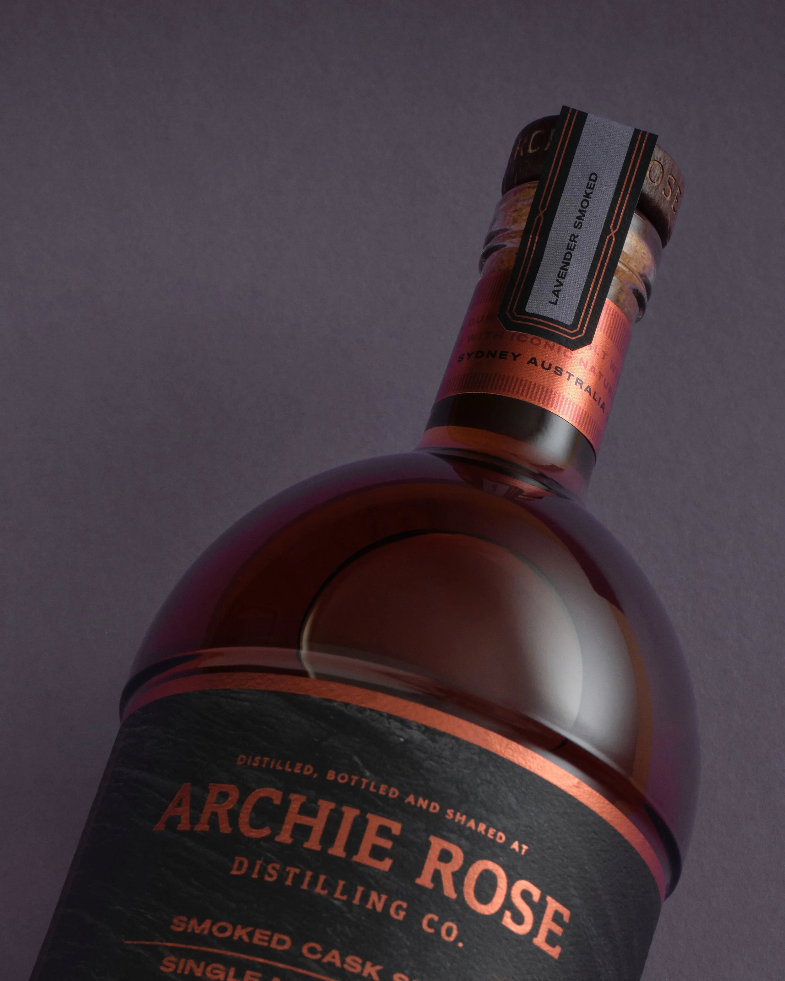 JODI HOOKER LAVENDER-SMOKED-SINGLE-MALT-WHISKY-SMOKED-CASK-SERIES-NECK-LABEL-FOCUS-ARCHIE-ROSE-LO-RES.jpg