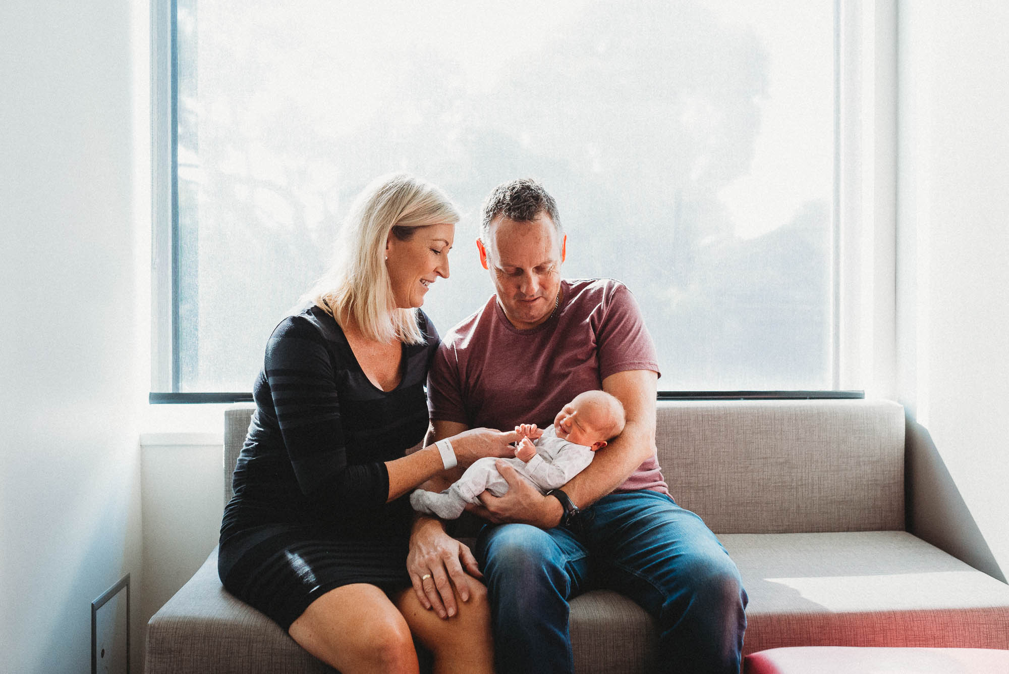 parents-holding-newborn-at-hospital-in-melbourne