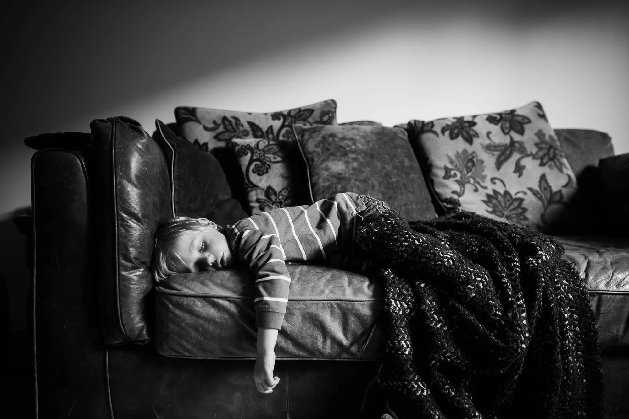 melbourne_family_photographer_boy_sleeping_on_the_sofa.jpg