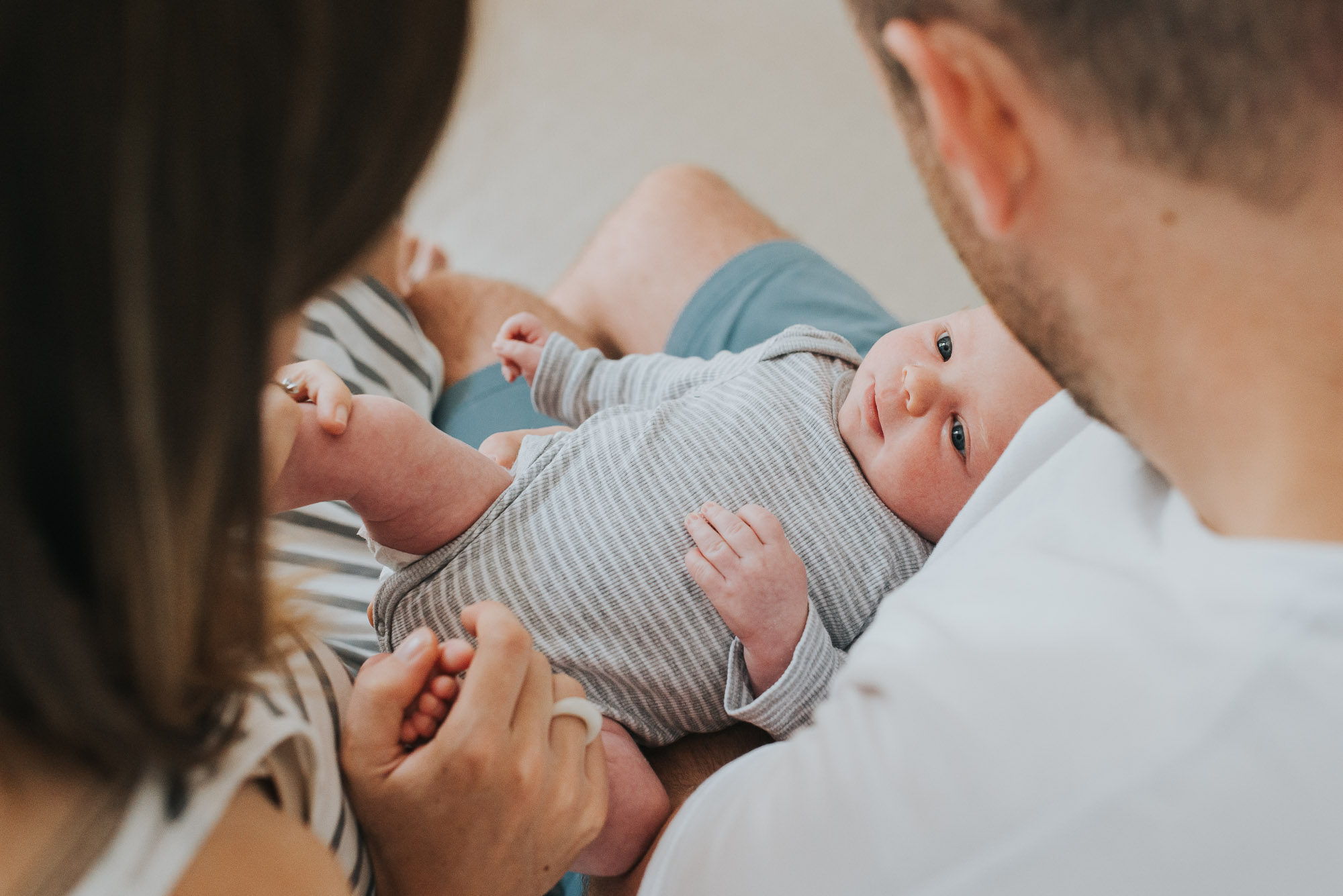 mum-and-dad-holding-newborn-jenny-rusby-photography-melbourne-newborn-photographer.jpg