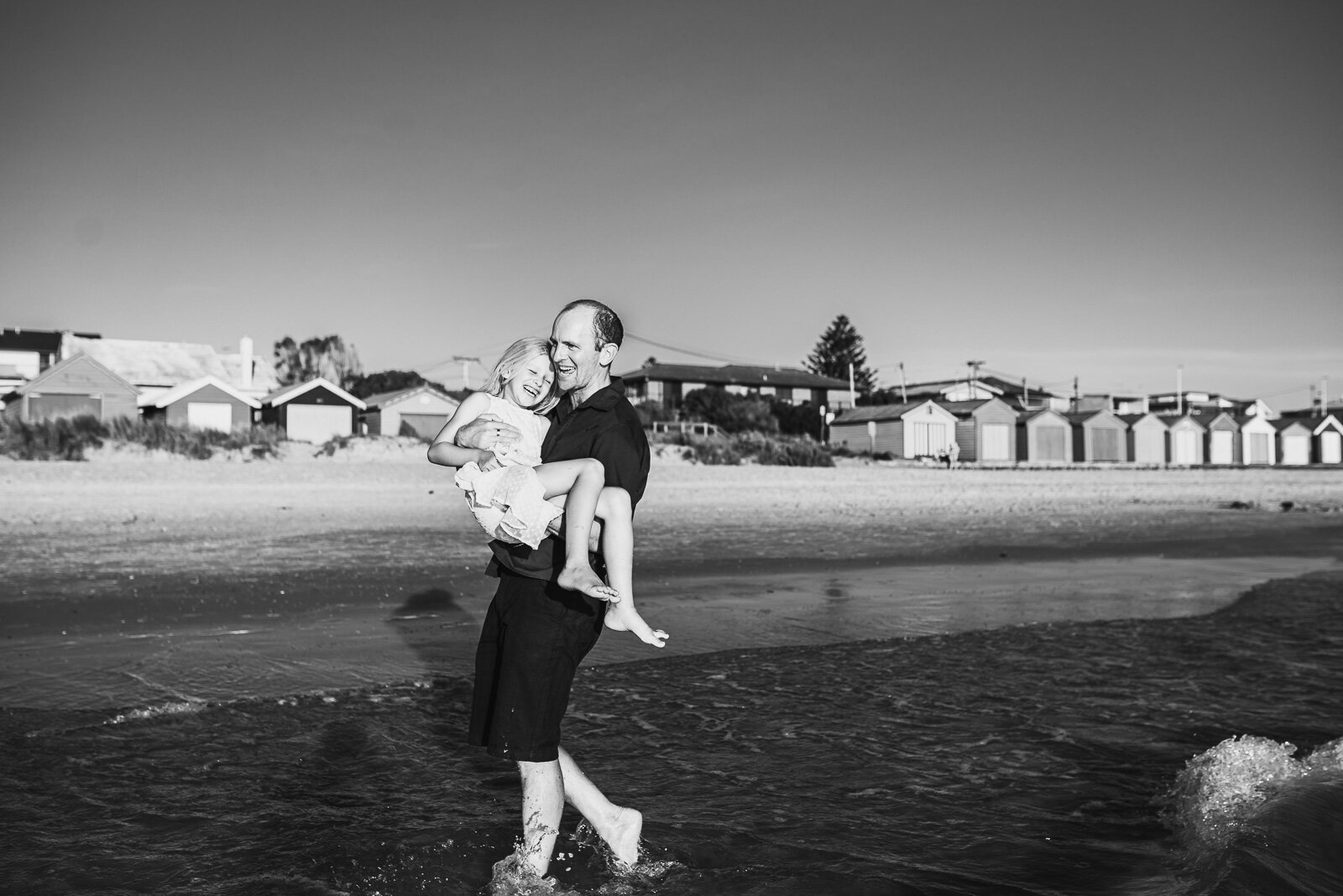 dad_and_daughter_playing_together_at_the_beach_melbourne_family_photographer-13.jpg
