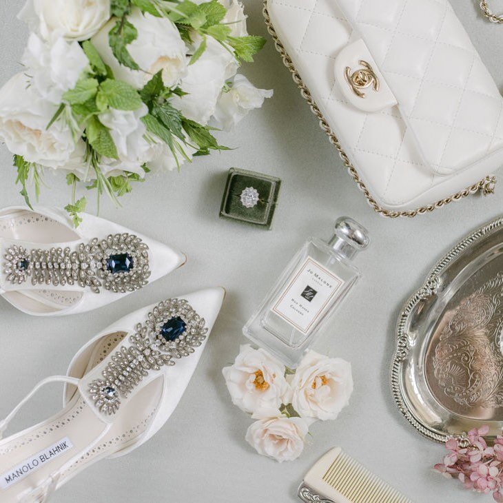 D E T A I L S 

Manolos, Chanel, Jo Malone and the most beautiful diamond engagement ring!

Gorgeous blue stone in the Manolo&rsquo;s for the ideal &lsquo;something blue&rsquo;.

#somethingblue #weddingdetails #weddingshoes #manolos #weddingbag #chan