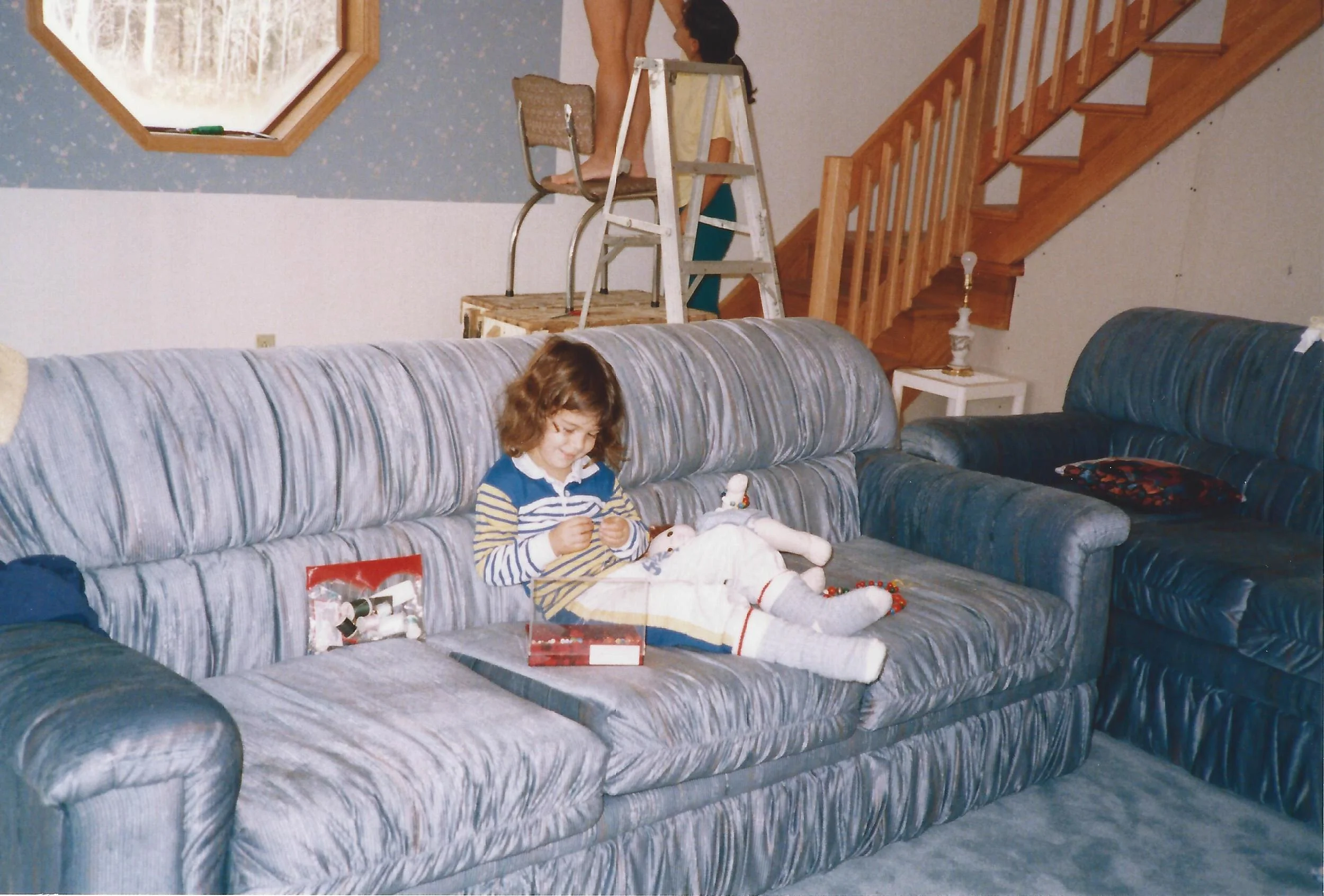 My parents always encouraged my crafty talents (note the chair on a box in the background? Seems like a precarious way to put up wallpaper)