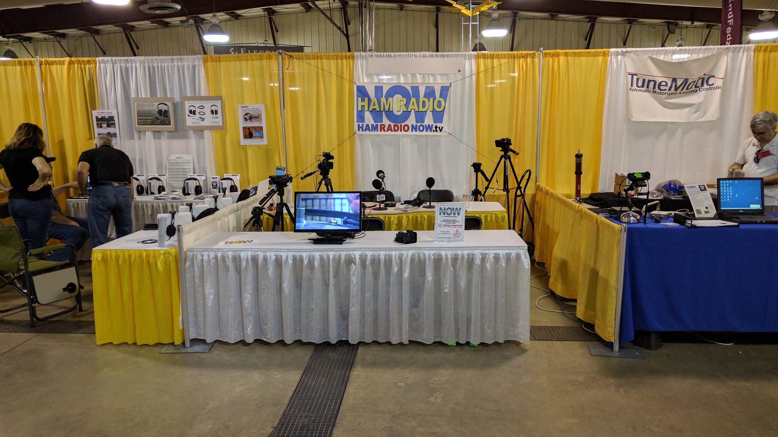 HamRadioNow booth at the Orlando HamCation, with neighbors Arlan Communications (left) and TuneMatic