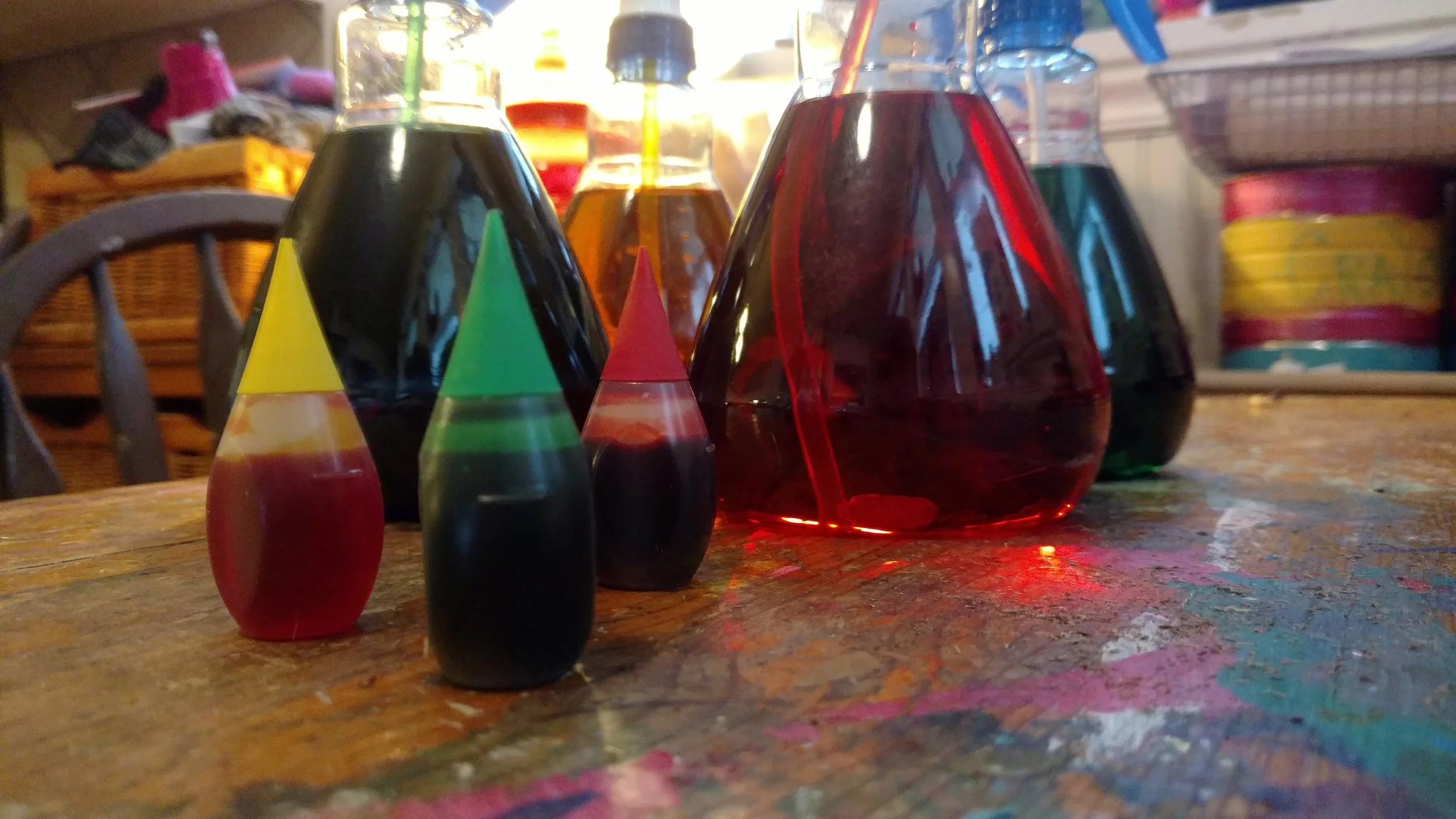 Food coloring and water makes snow paint.