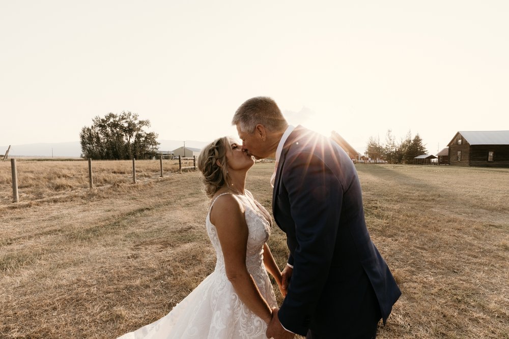 Bride and Groom Embrace at Golden Hour