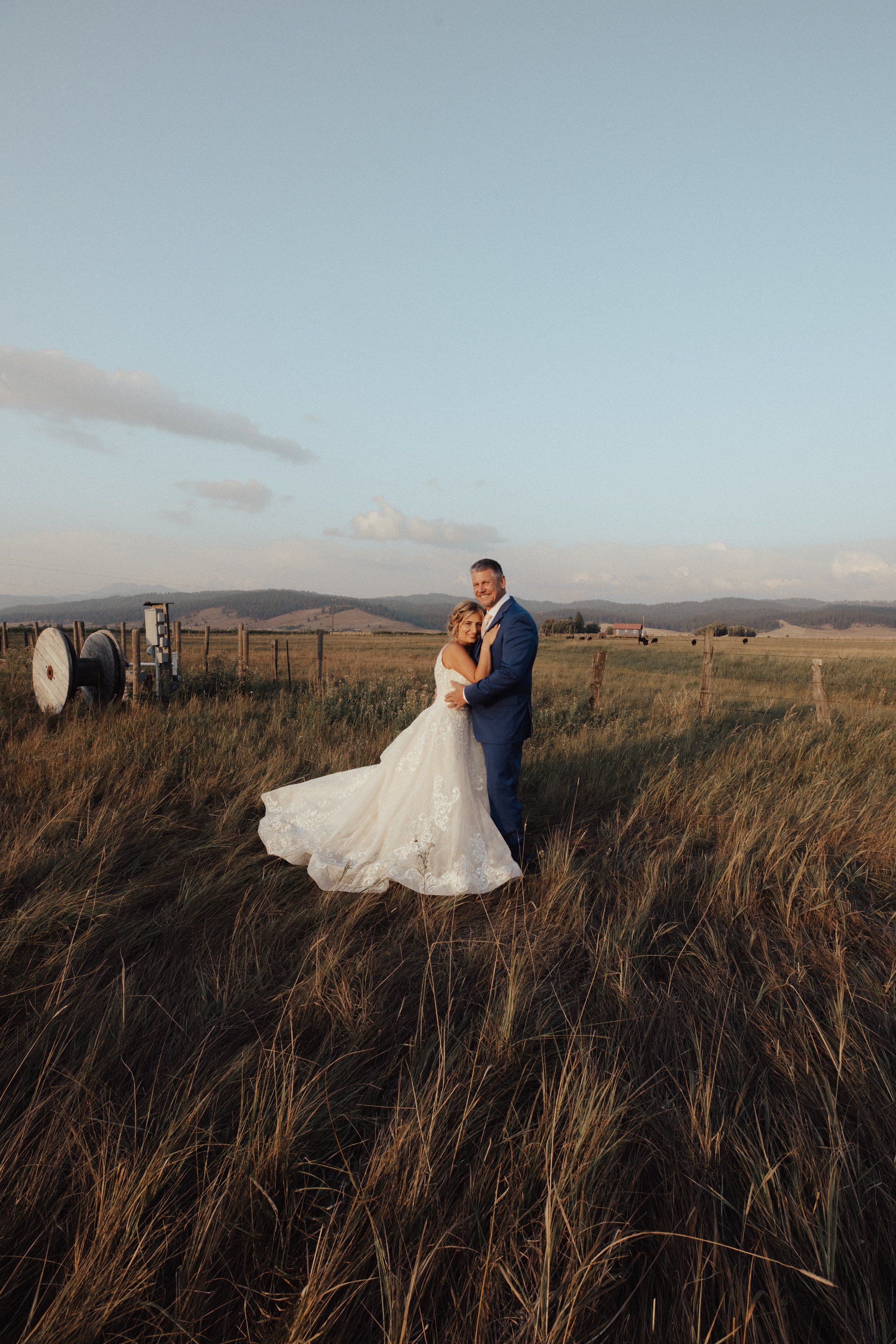 Bride and Groom in Field at Golden Hour 