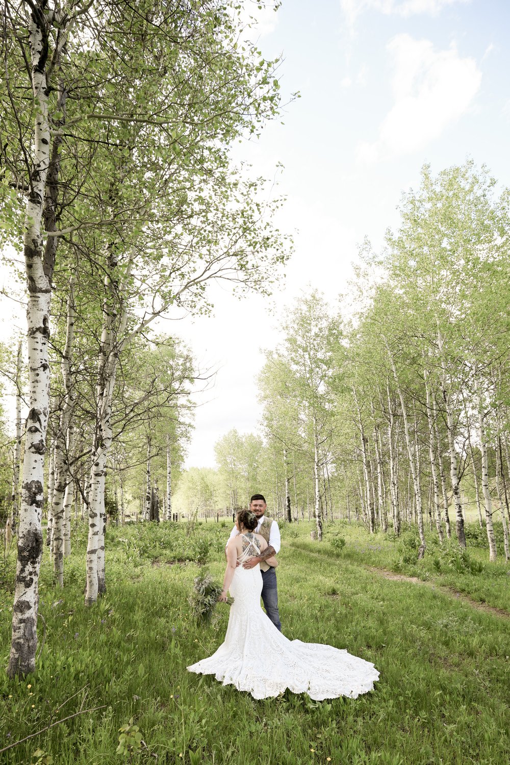 Bride and Groom in Aspen Grove