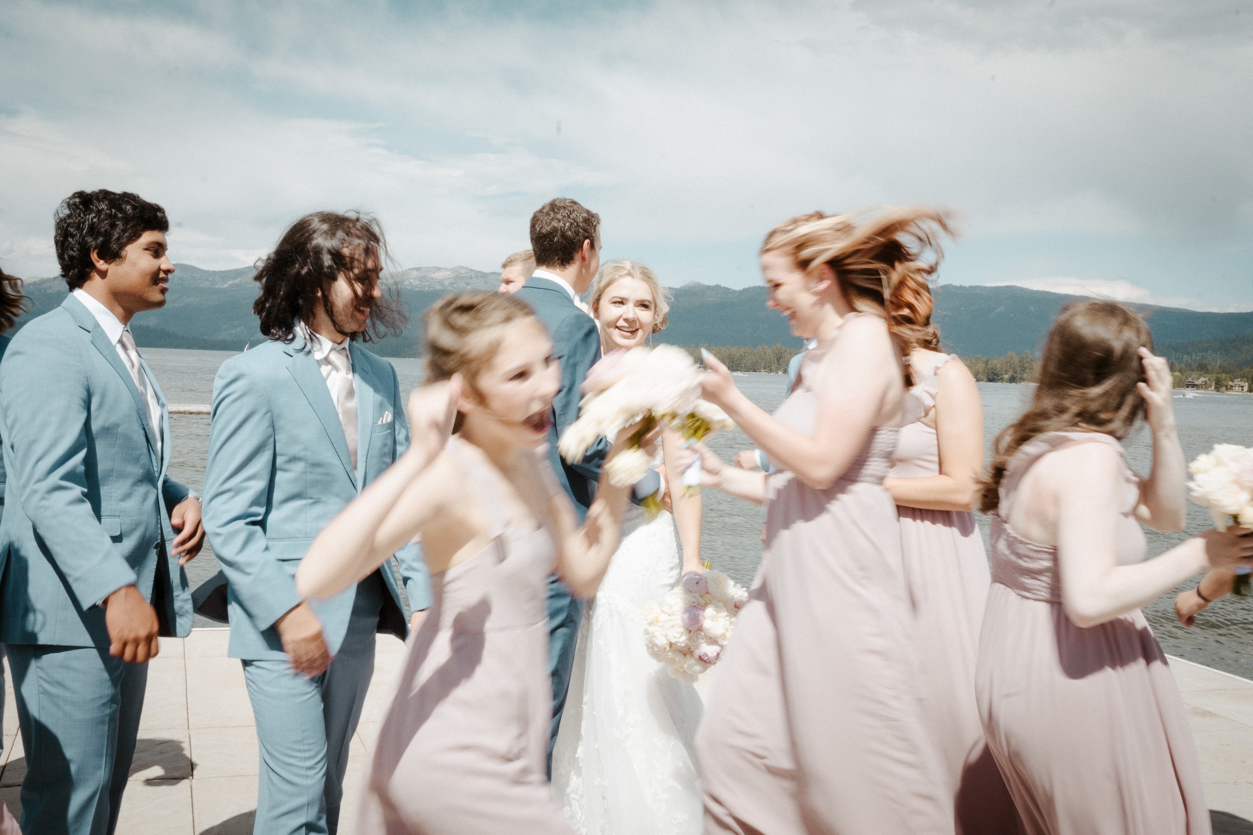 Bridal Party Dance around Couple