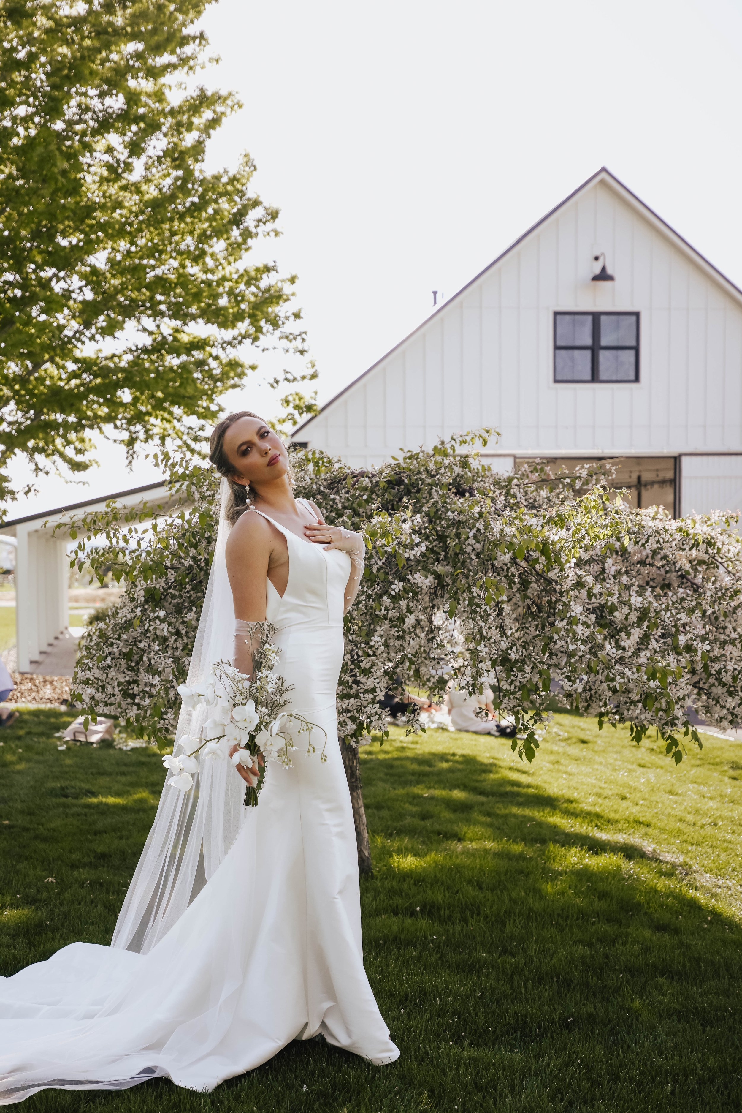 Bride in front of White Barn (Copy)