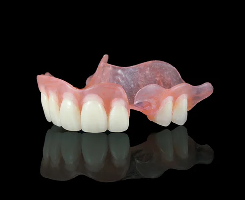 Removable restorations , such as dentures, flexible and alloy partial dentures carry a service warranty of 2 years* from date of manufacture for a one-time reline, repair, or replacement per device. Upon repair or reline, the service warranty is retired. Upon a one-time replacement, the remainder of the original warranty period, from original date of manufacture, remains intact. Immediate partial and immediate full dentures are not warranted.