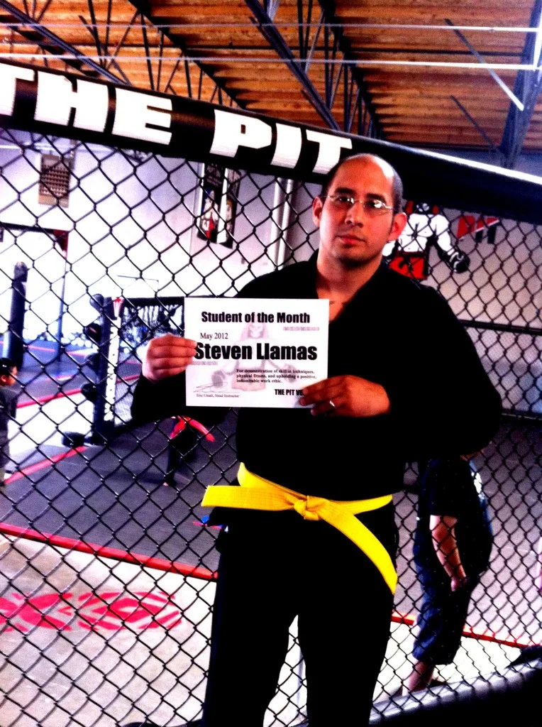 Steven LLamas is one of our hardest workers – always coming to Belt class, Pit Jitsu, and sparring. He has taken his licks but now is starting to dish out some punishment as well. More importantly he is a team player, humble, and a great addition to the Pit family. Steven has just been promoted to yellow belt and is well on his way to his blackbelt at the rate he’s going!