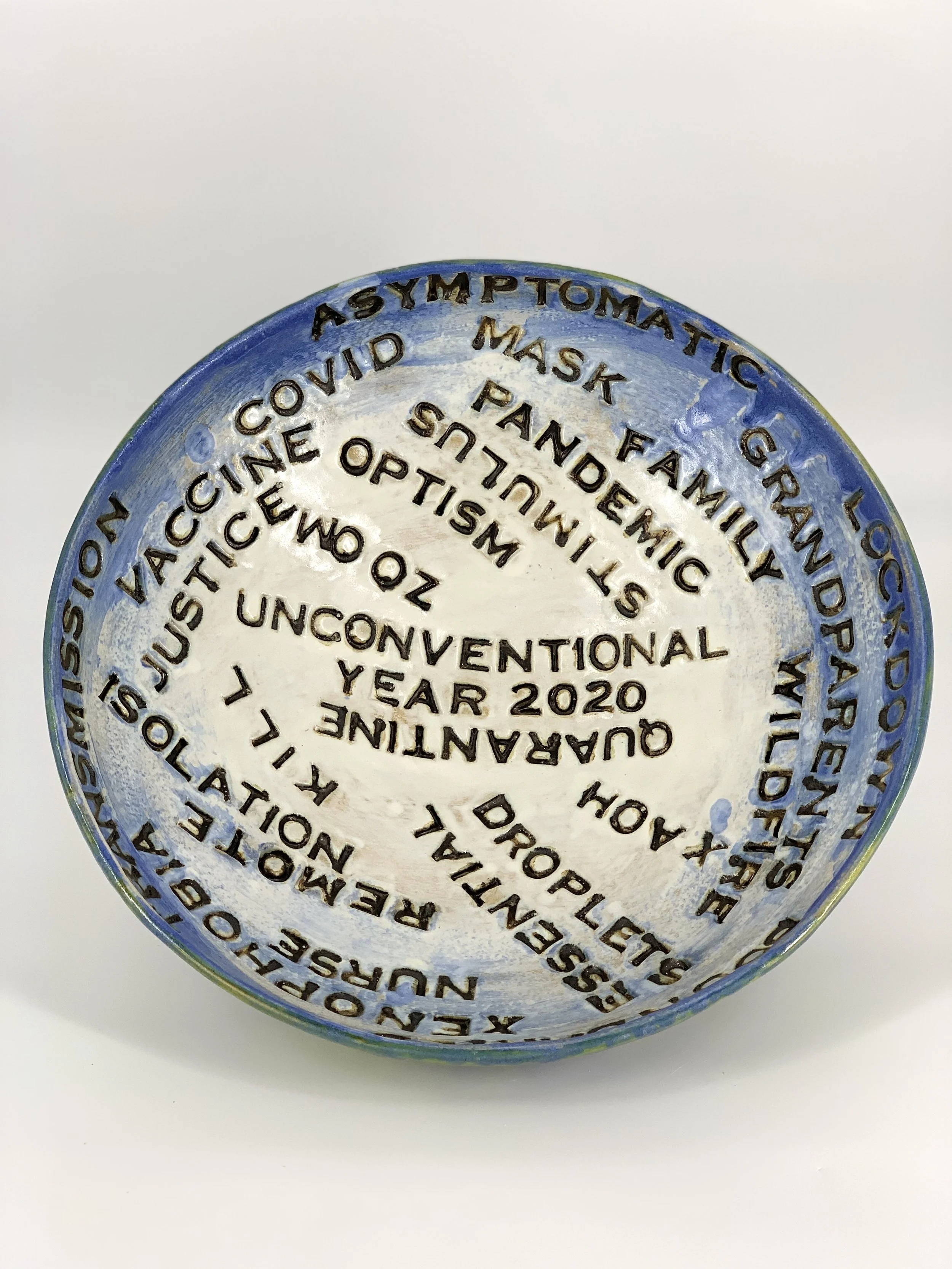 alphabet (Pandemic) soup in a globe bowl