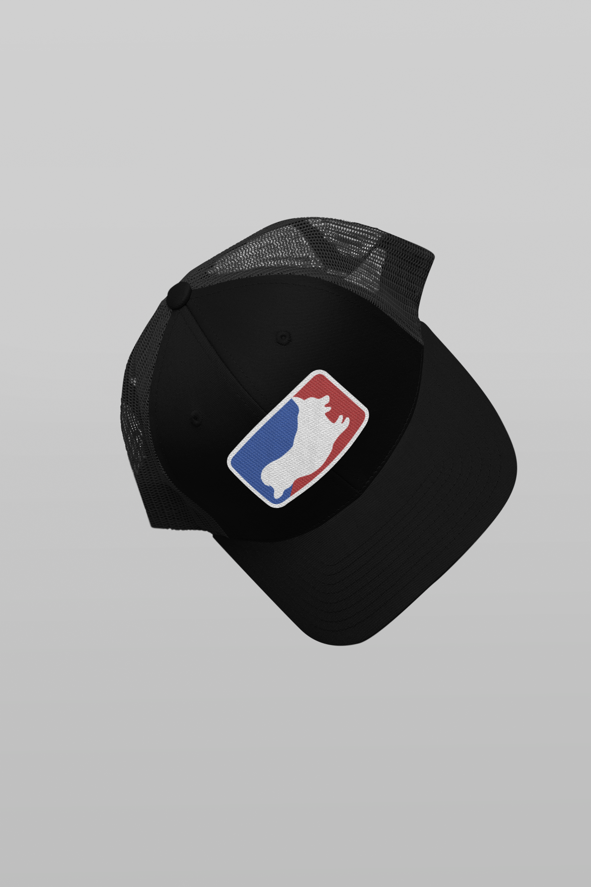 mockup-of-a-trucker-hat-floating-over-a-solid-surface-m33410 (1).png