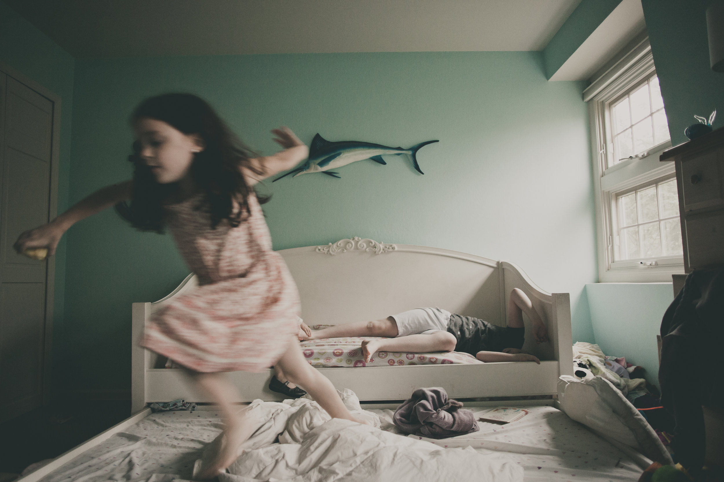 © duston-todd-lifestyle-motion-girl-jumping-bed.jpg