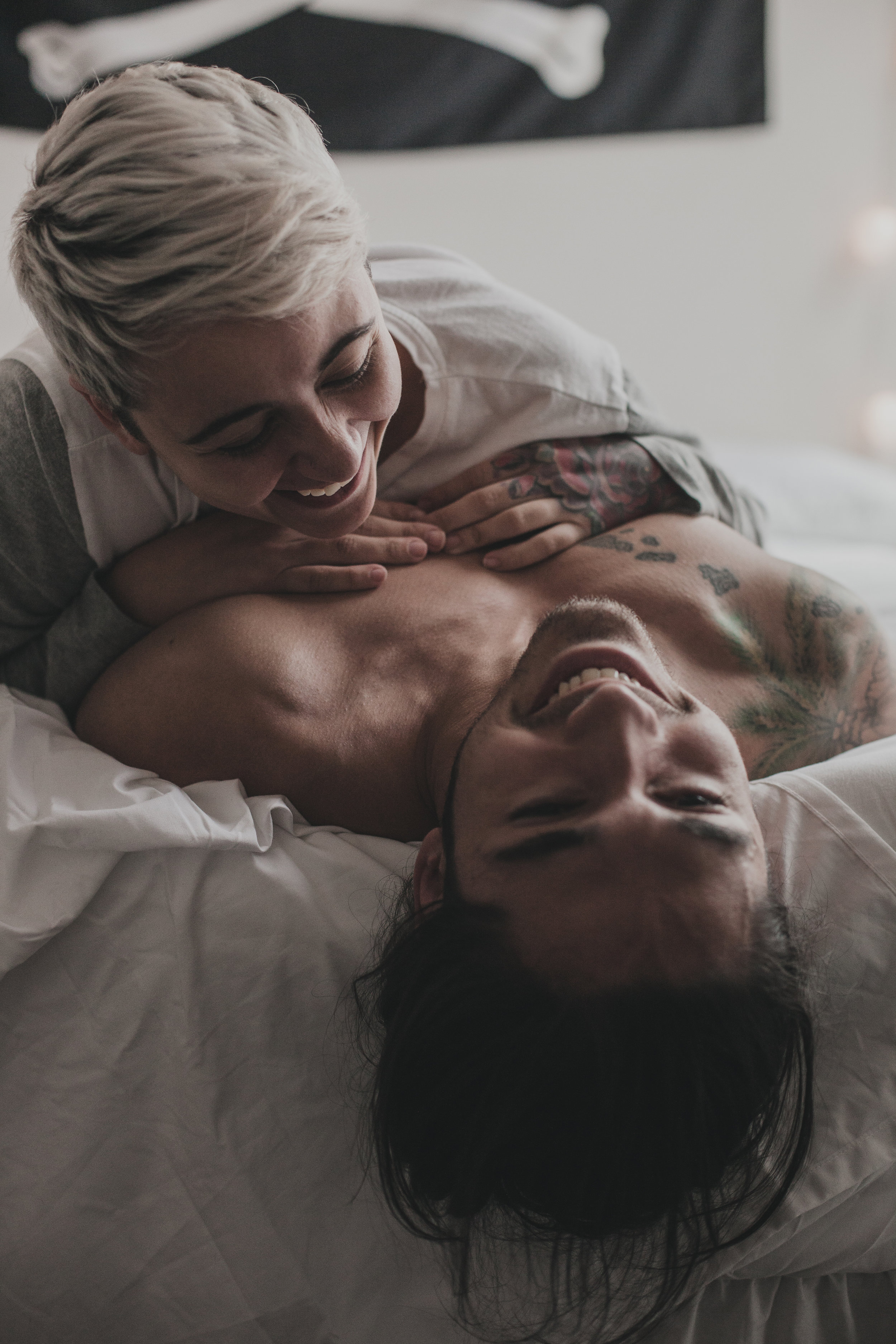 © duston-lifestyle-couple-laughing-bed.jpg