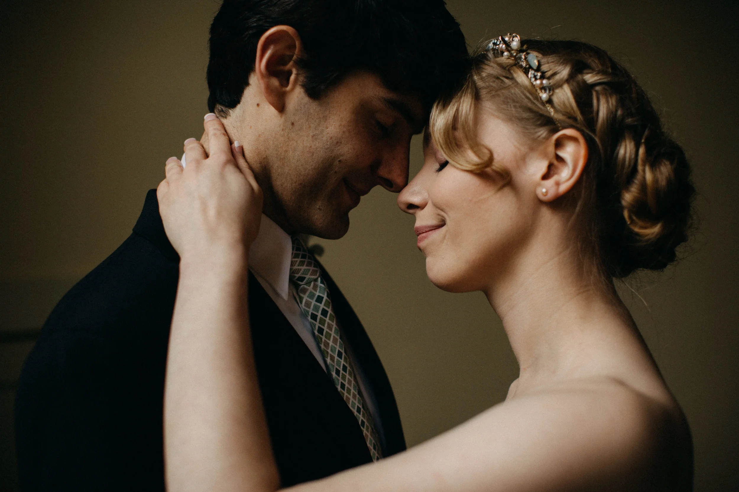 Portrait of couple embracing.