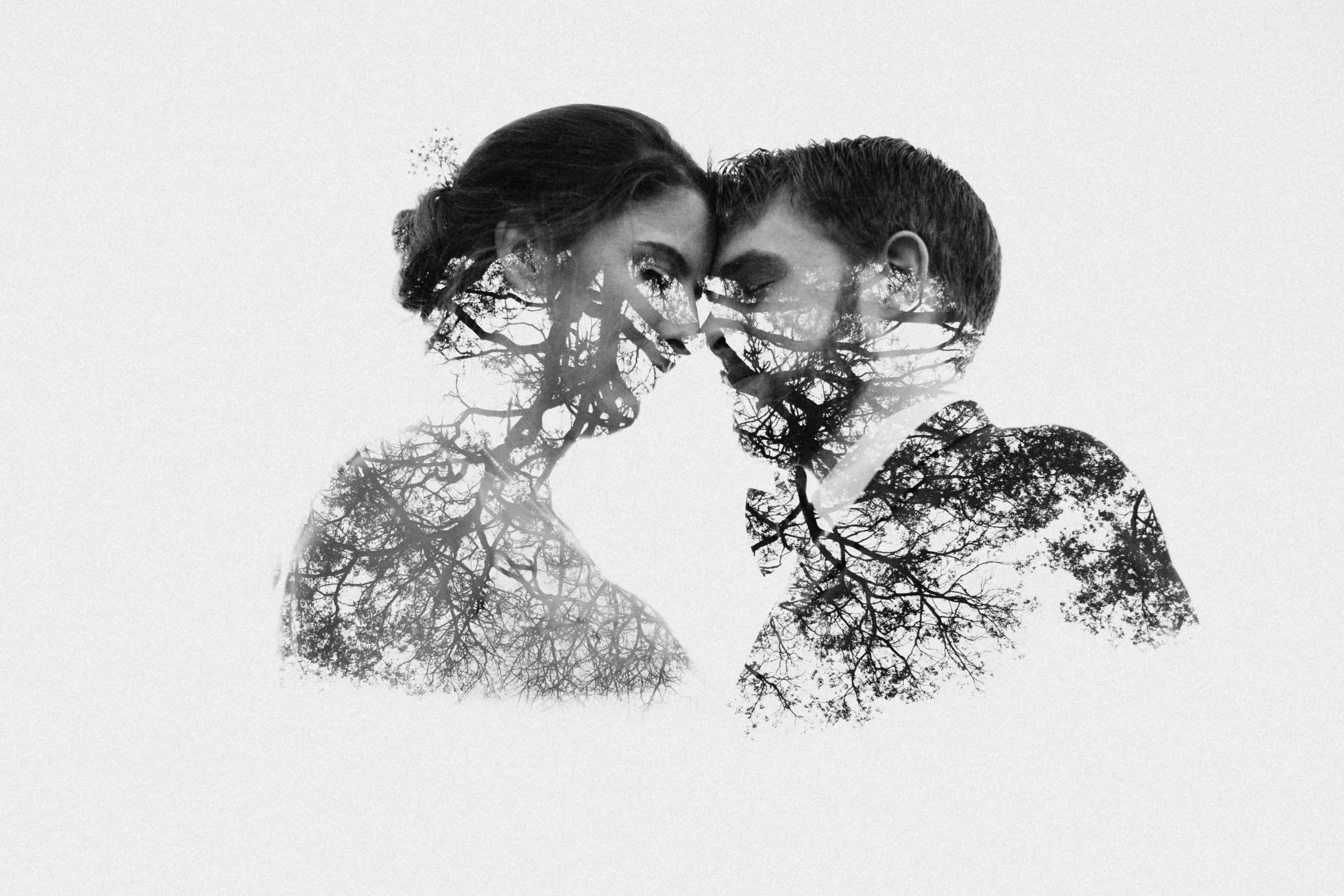 Portrait of couple with trees.