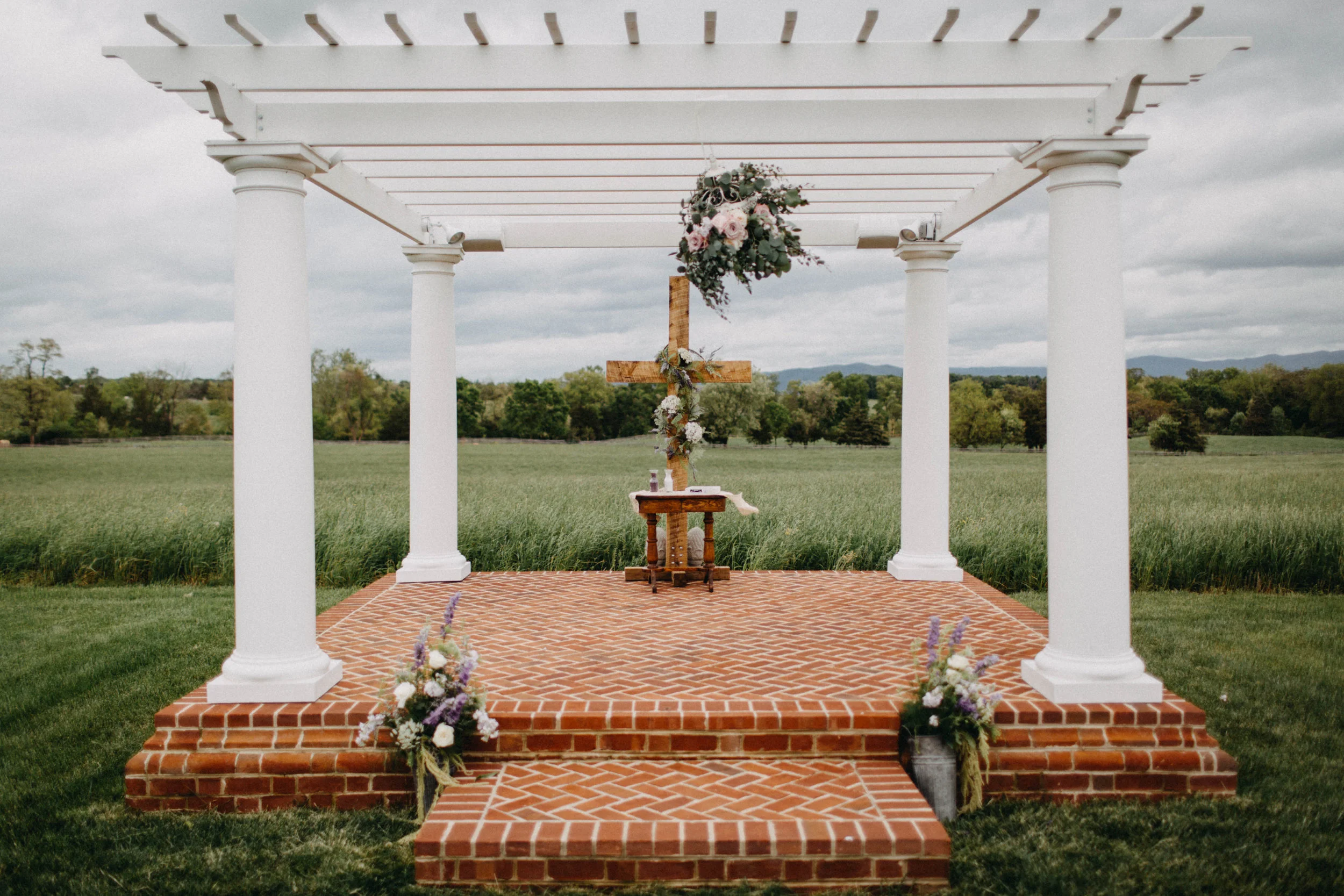 Ceremony site under arbor. 
