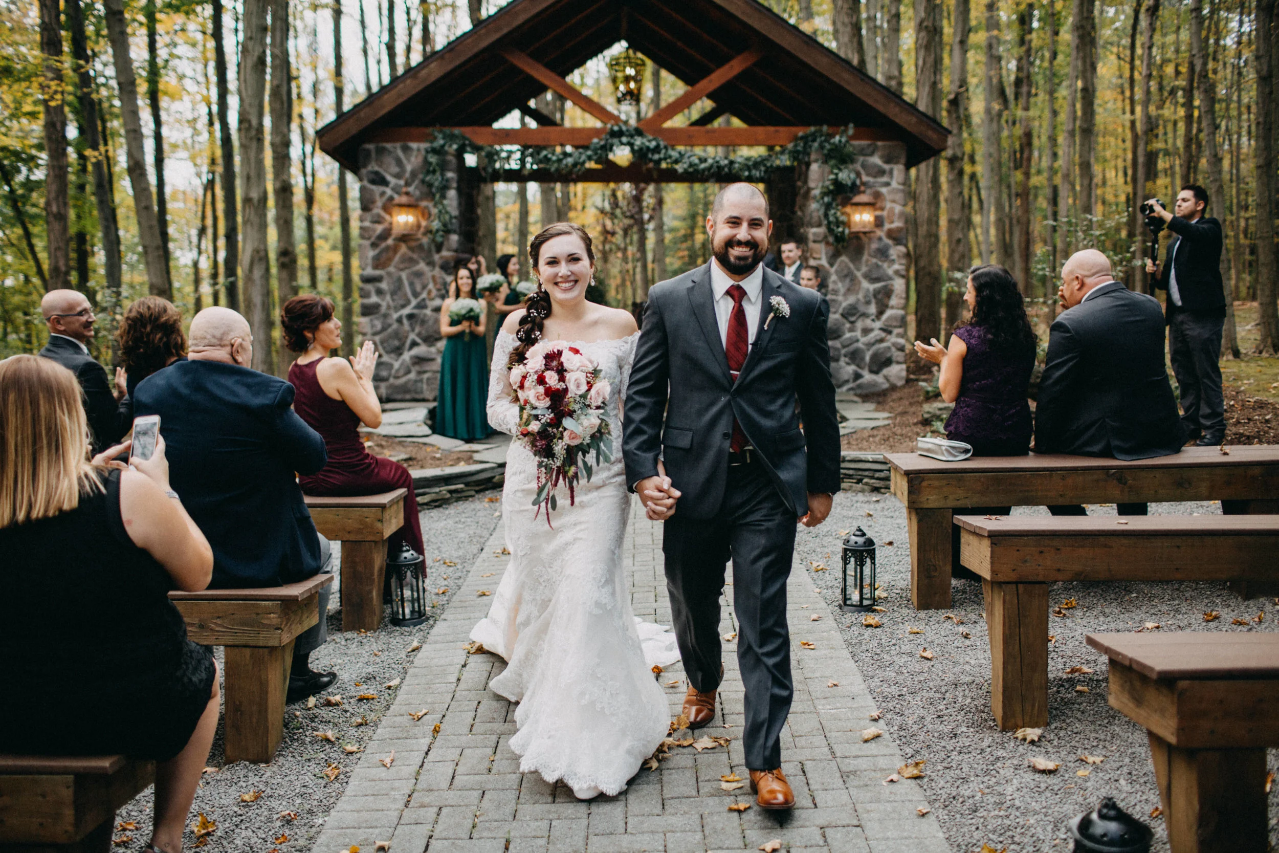 Photo of bride and groom exiting wedding ceremony at Stroudsmoore Country Inn, in PA.