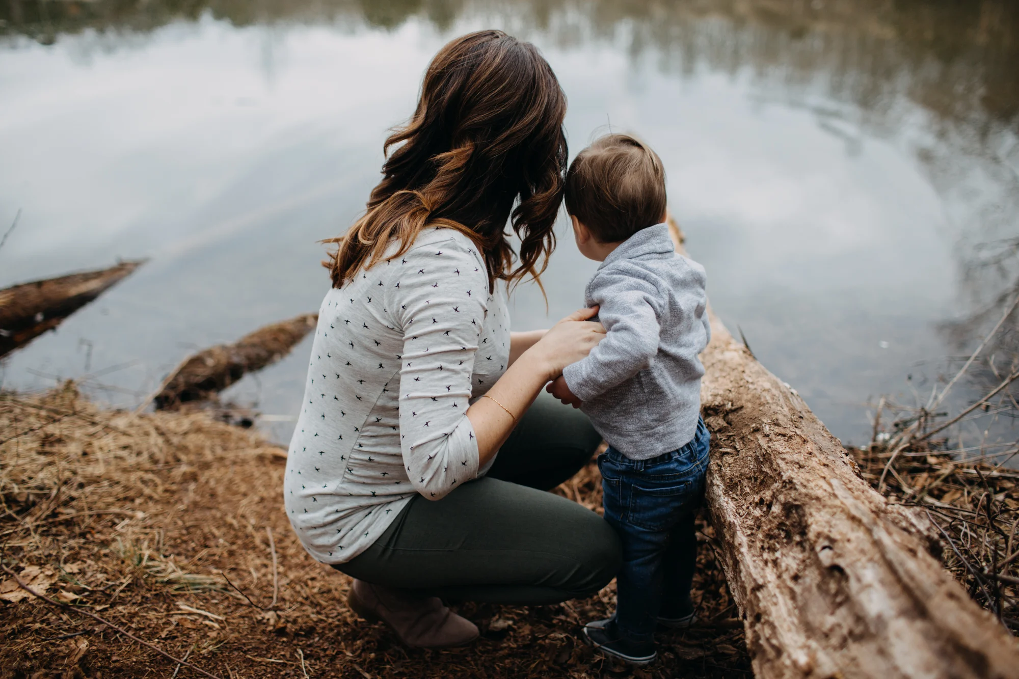 mom and son by lake