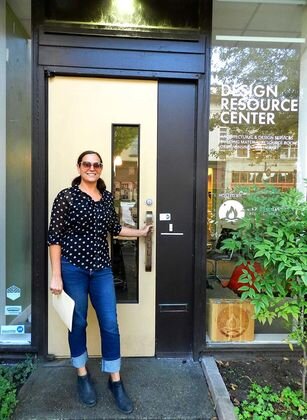 Jenna Fribley at the door of her firm, Campfire Collaborative, Architecture &amp; Design, located at 341 Main St. [Victoria Stephens/The Chronicle]