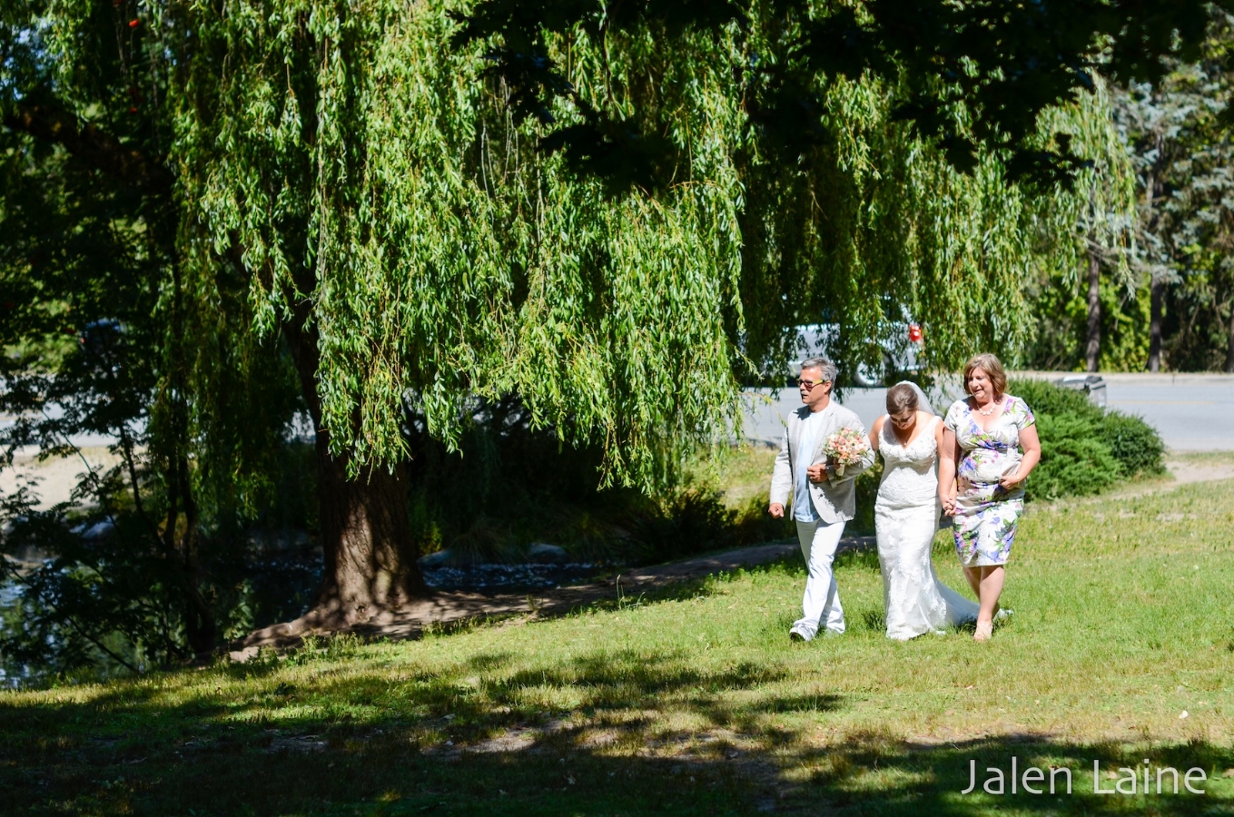 Katie had both her mom and dad walk her toward her groom.