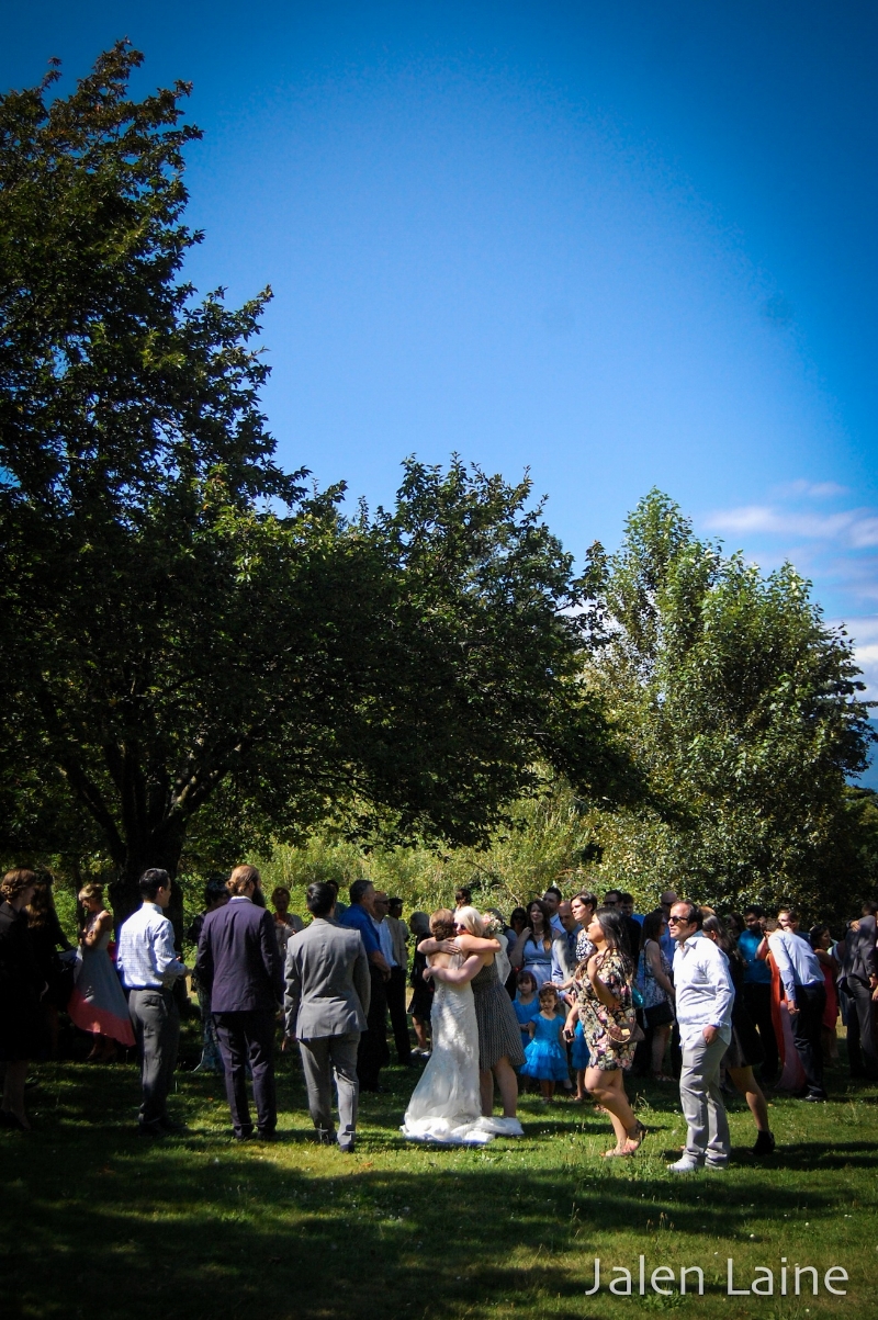 At the end of the ceremony, M&K greeted each and every guest under the shade of some nearby trees.