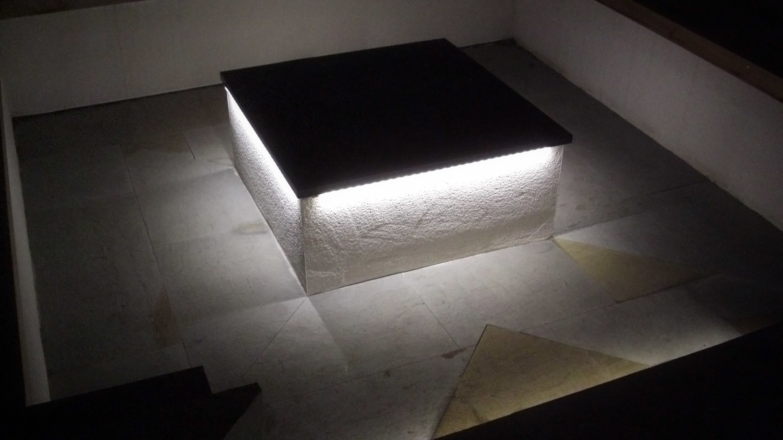 Garden feature lit table in seating area
