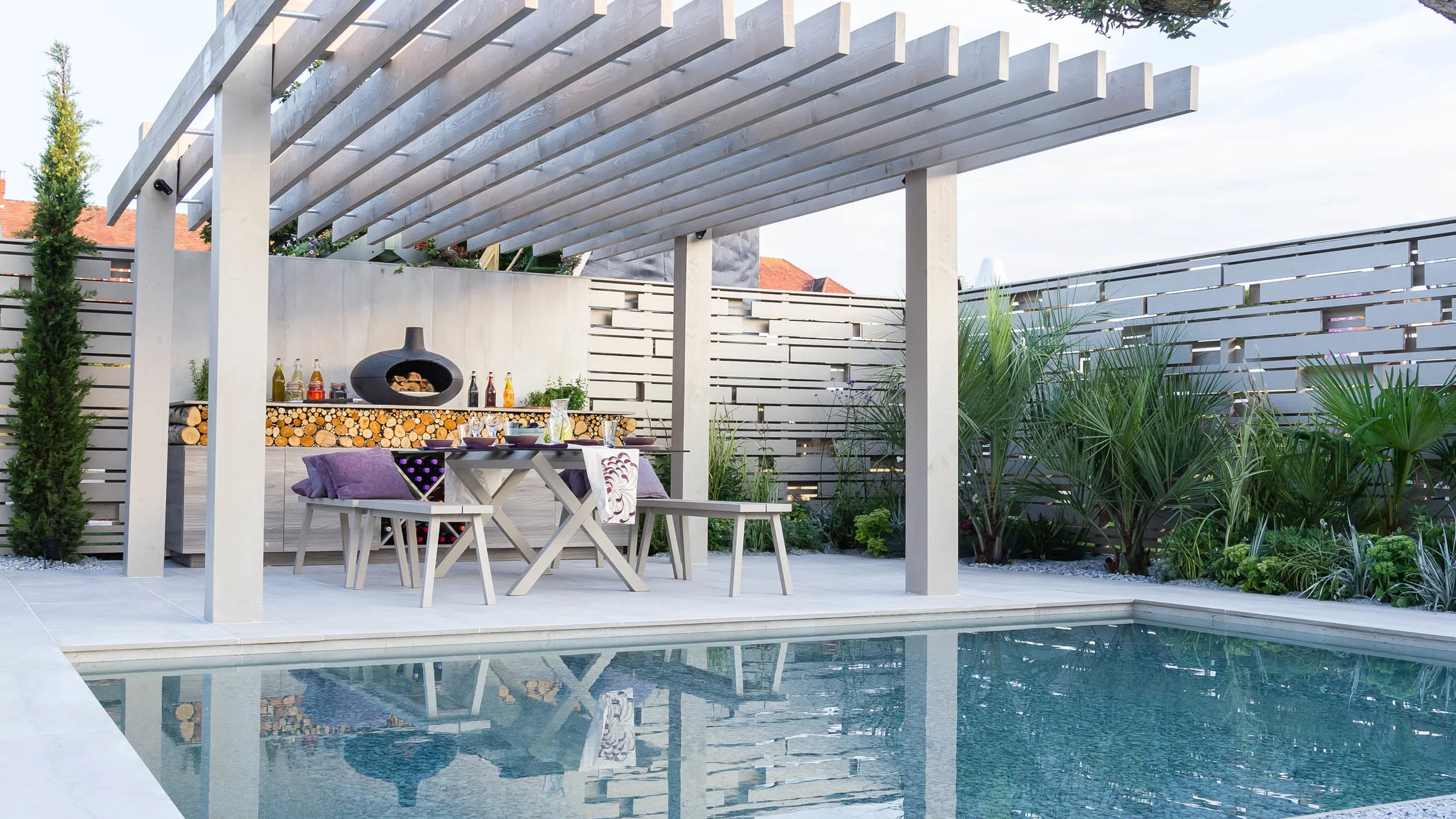 Southport Garden Design: A View Of The Olive Tree: Pergola Over Seating Area And Outdoor Kitchen