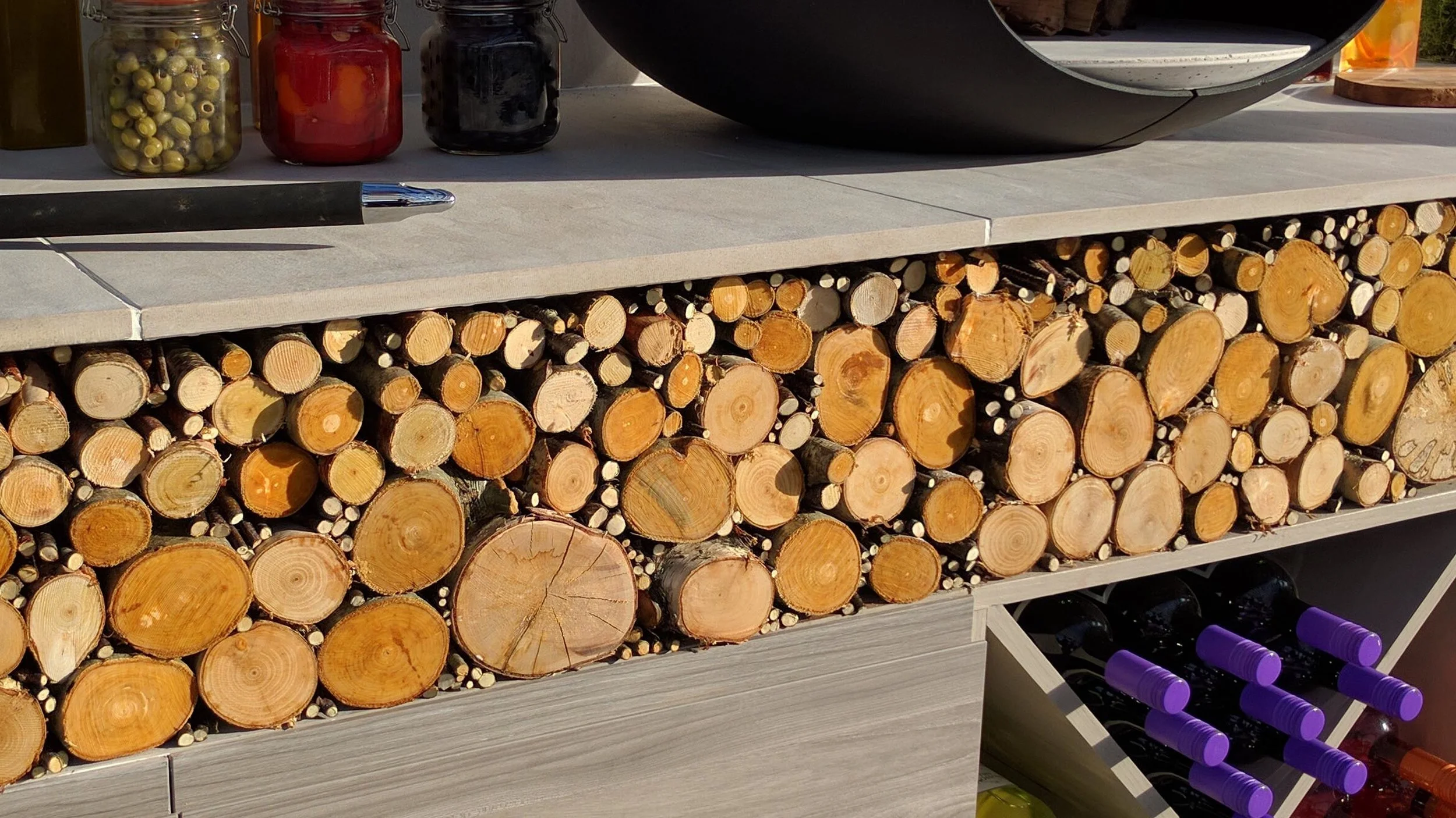 Southport Garden Design: A View Of The Olive Tree: Log Store And Wine Rack