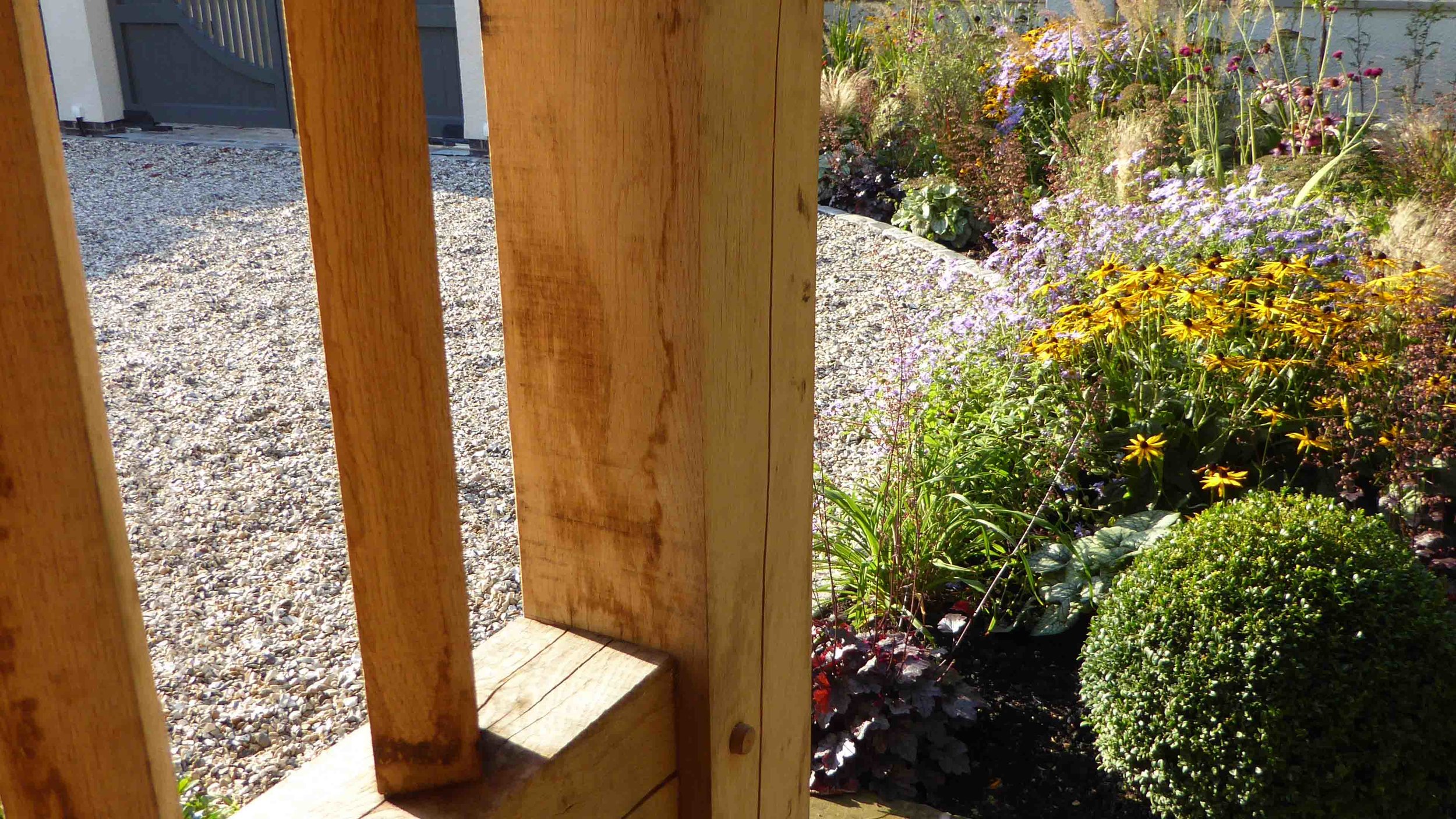 Cheshire Garden Design: The Sun and Shade Garden: Full Sun Border looking through Oak Porch