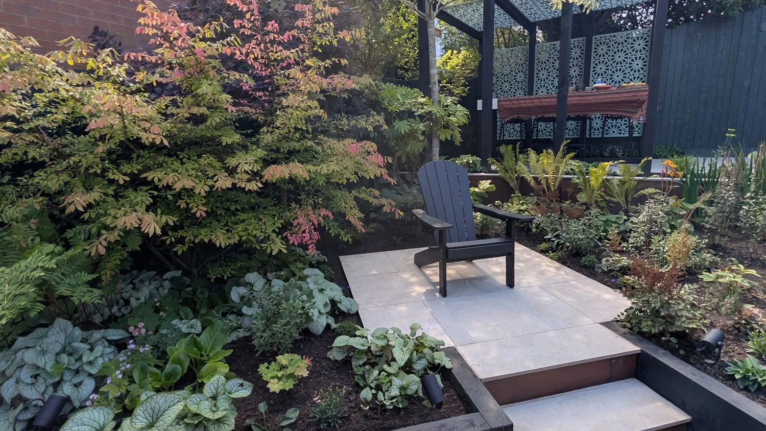 Secluded Garden Seating Terrace with Shade Planting