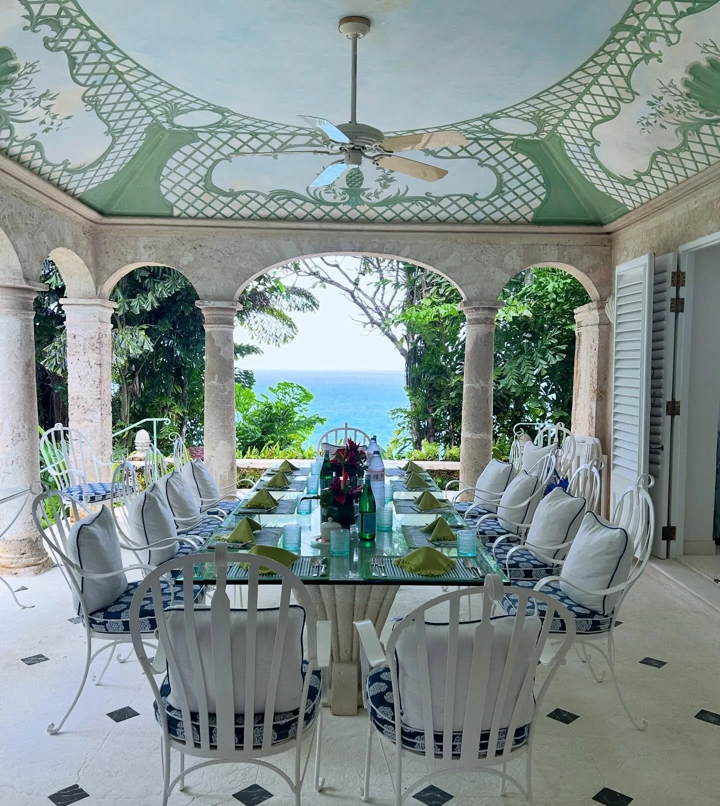 New York has many wonderful qualities, but a climate for indoor/outdoor dining rooms is not one of them. So I&rsquo;m very much enjoying the ceiling murals in this space, at one of the only Oliver Messel homes still standing in Barbados.
