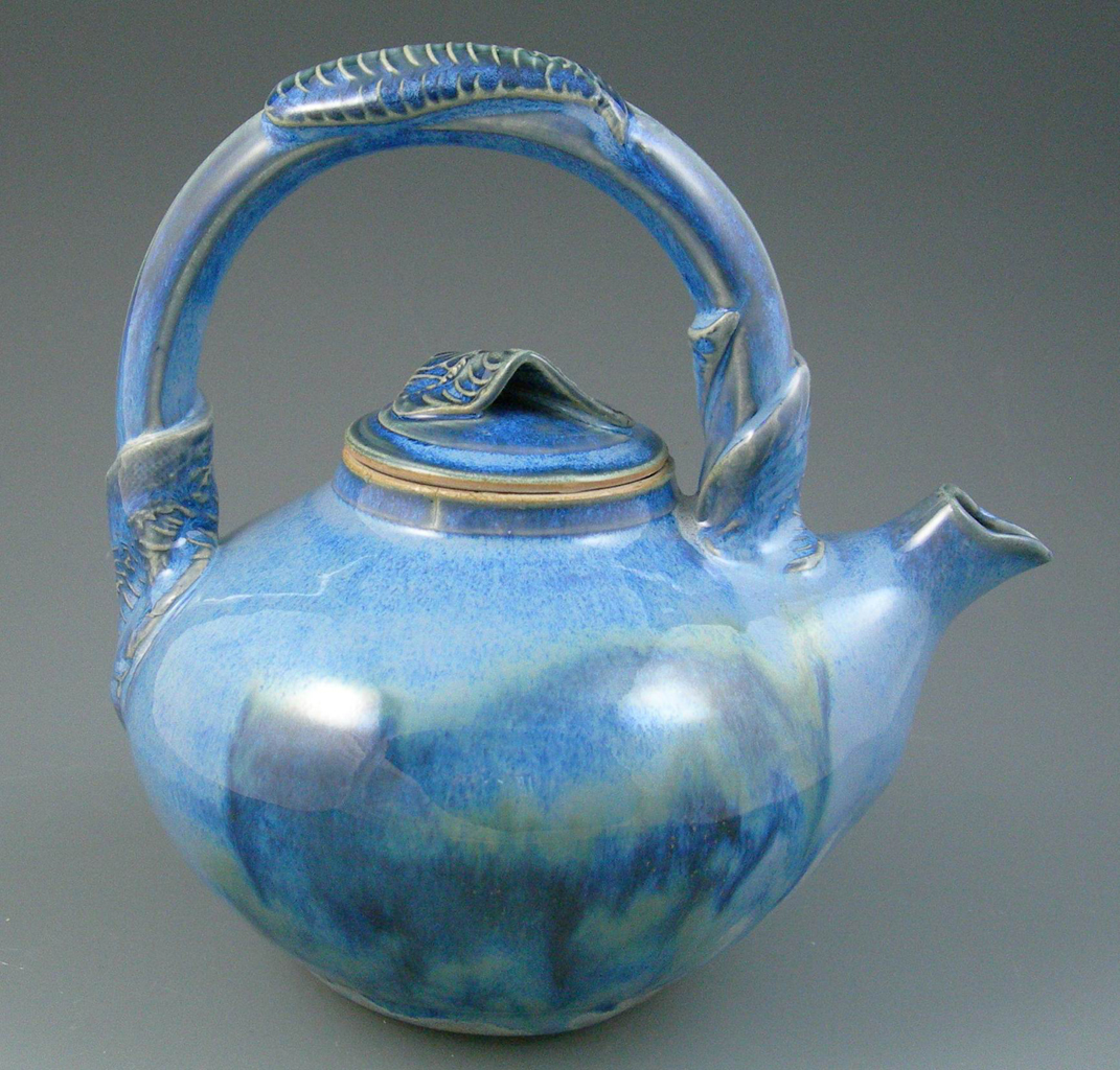 8 inchstoneware  teapot, sprigged leaf additions, blue glazes, Gail Johnston.JPG