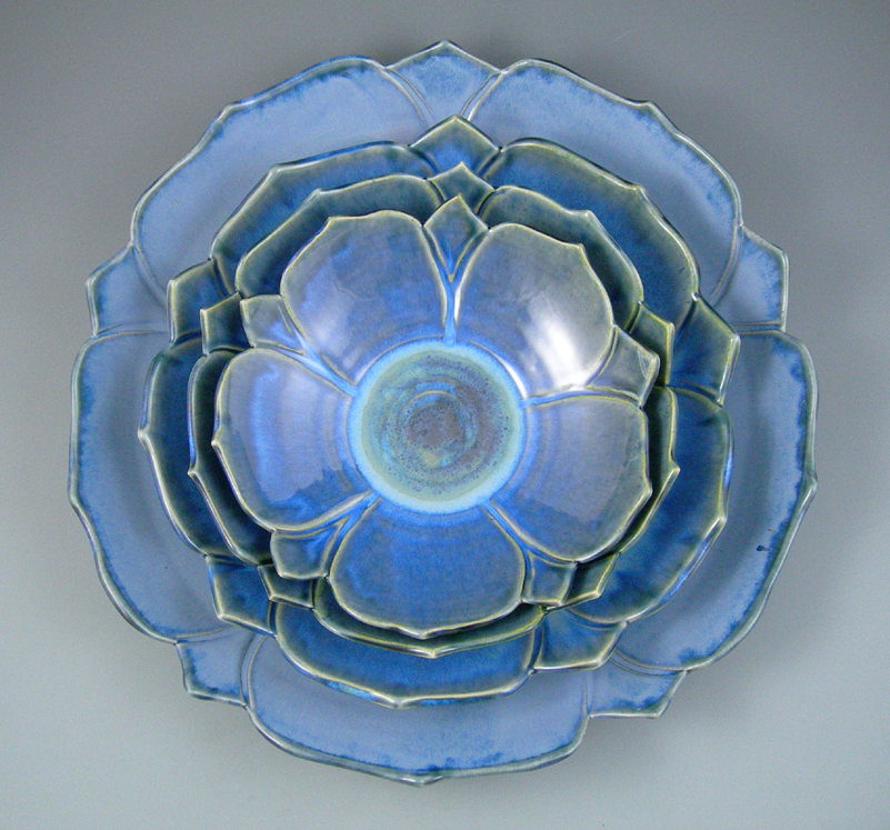 18 inch set ofstoneware columbine bowls, cut edges, blue glazes, Gail Johnston.JPG